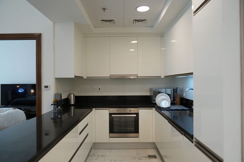 Design Apartment | Private kitchen | Fridge, microwave, oven, stovetop
