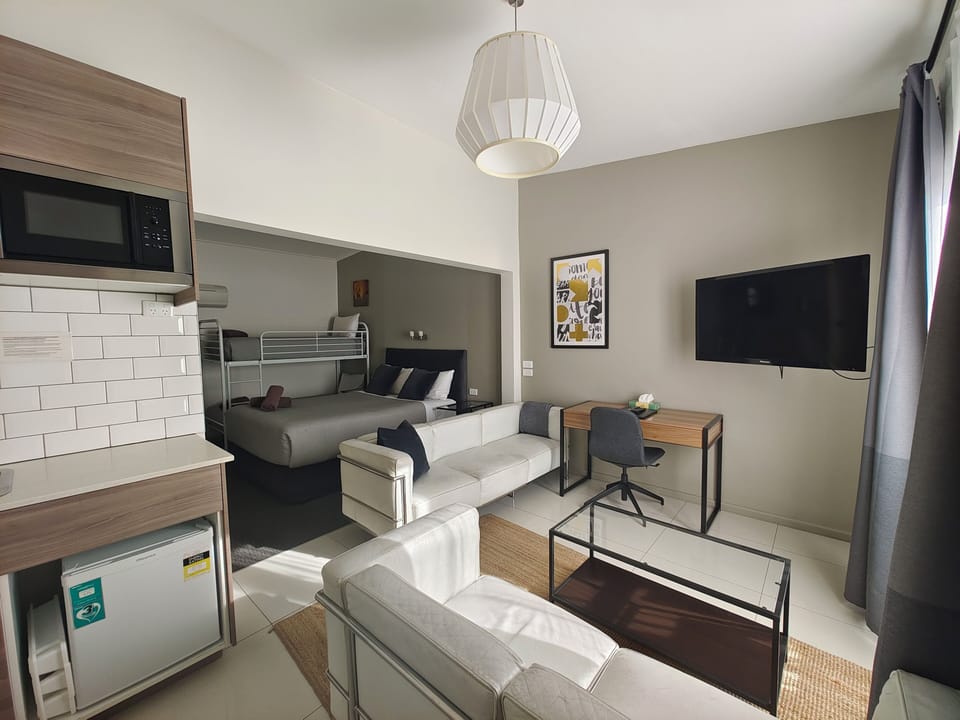 Studio with Queen and Bunk | Desk, laptop workspace, iron/ironing board, free cribs/infant beds