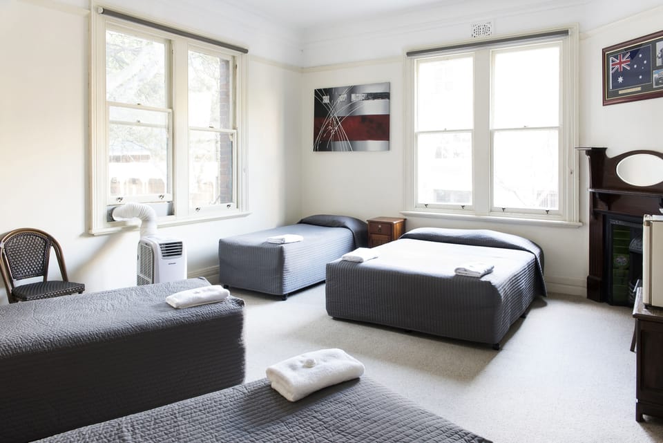 Group Room with Shared Bathroom | Iron/ironing board (on request), WiFi (free), bed sheets