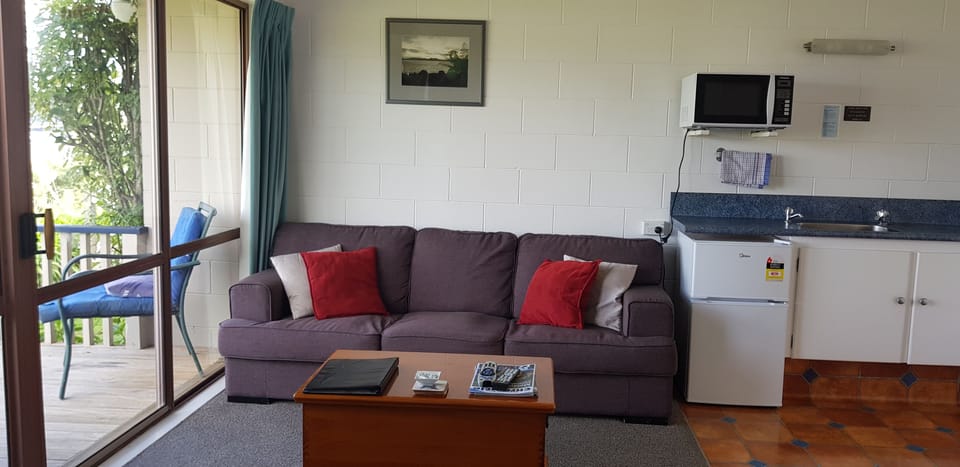 Standard Suite, 1 Bedroom, Non Smoking, Kitchen (Harbour View Unit) | Living area | Flat-screen TV