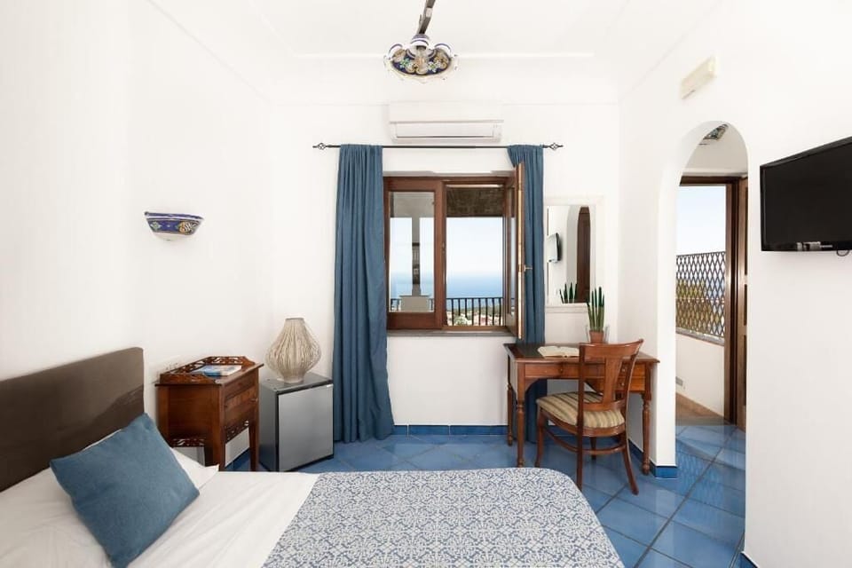 Panoramic Double Room, 1 Bedroom, Terrace, Sea View | Minibar, in-room safe, desk, iron/ironing board