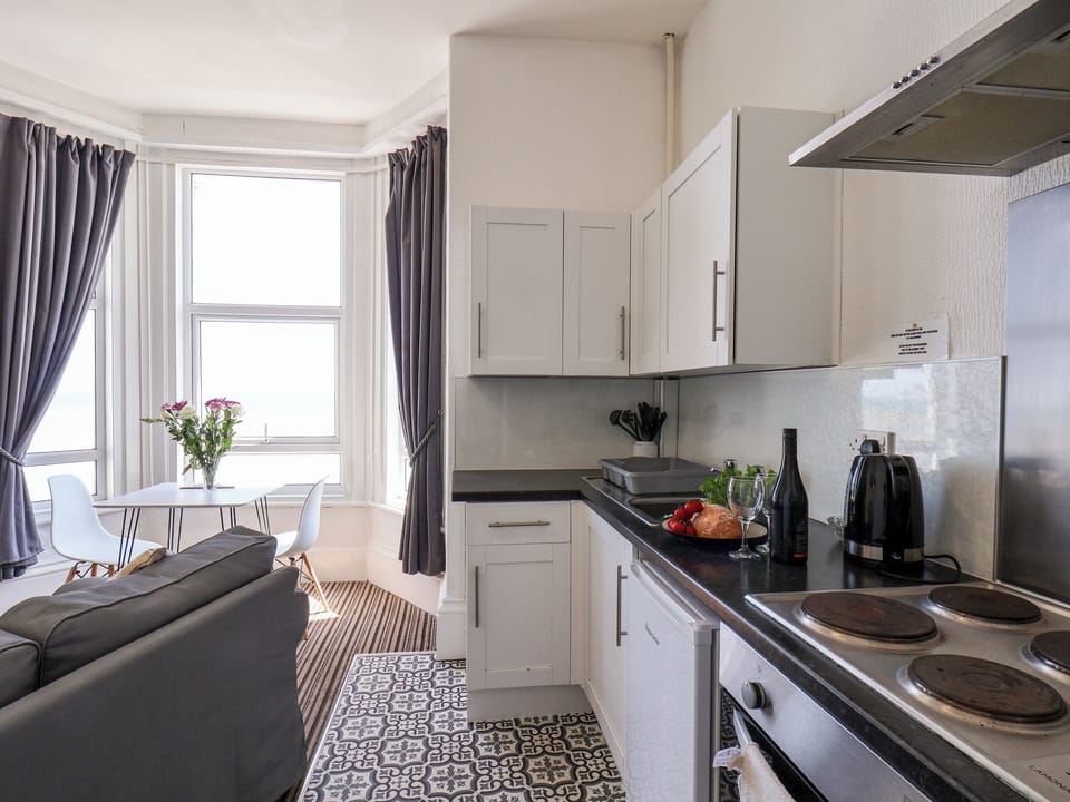 Fridge, electric kettle, toaster, cookware/dishes/utensils