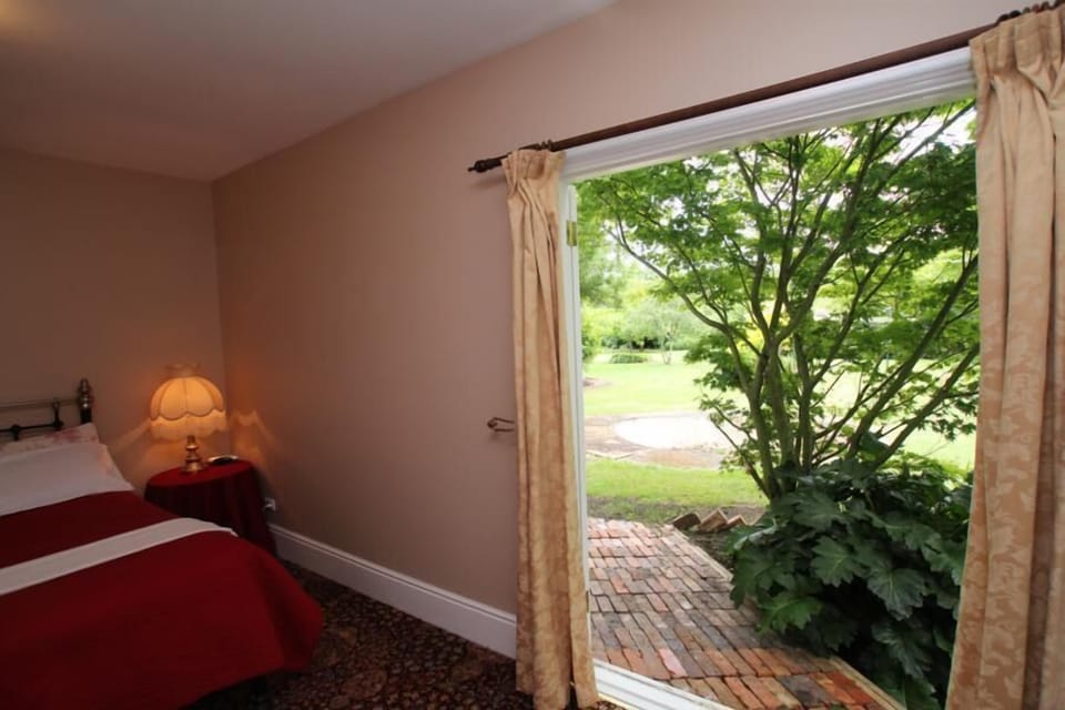 Garden Room, Accessible (Frank's Unit) | 1 bedroom, premium bedding, individually decorated