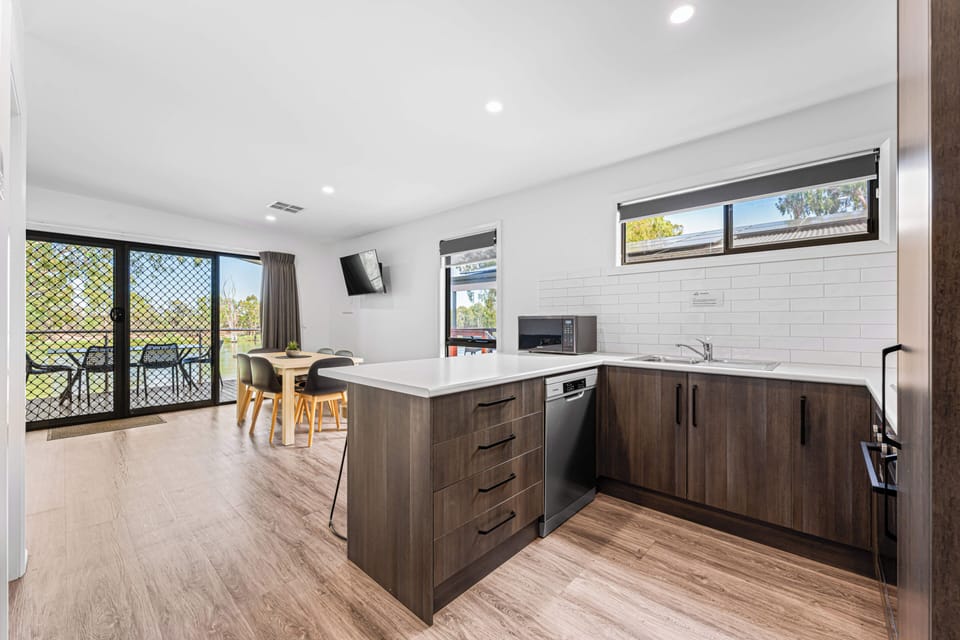 Deluxe Elevated Riverfront Cabin | Private kitchen | Fridge, microwave, oven, stovetop