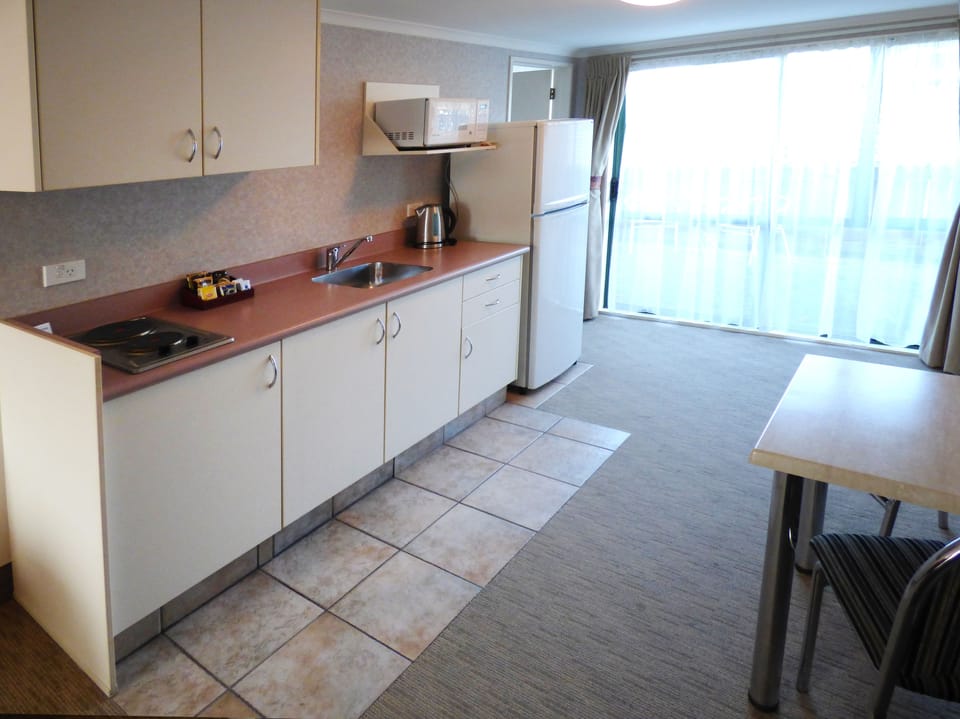 Fridge, microwave, coffee/tea maker, toaster