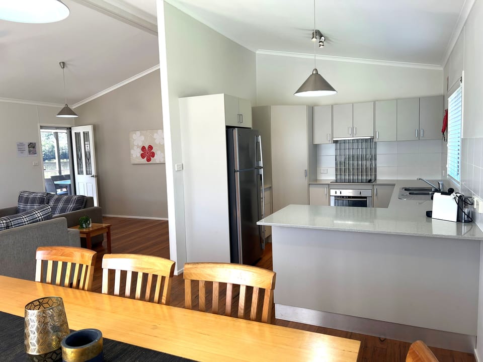 Deluxe River View 3 Bedroom House | Private kitchen | Shared microwave, toaster, cookware/dishes/utensils, dining table