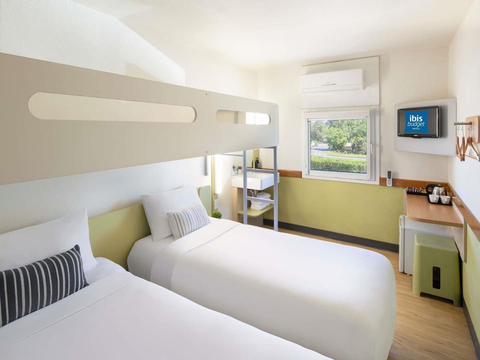 Standard Room, Multiple Beds | Premium bedding, desk, iron/ironing board (on request), WiFi (free)