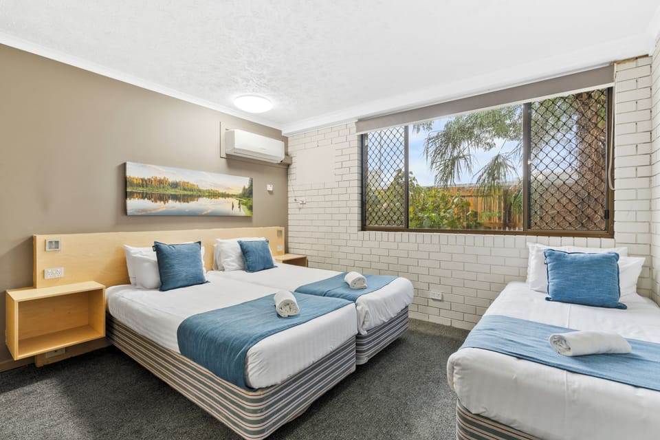 Economy Triple Room | Egyptian cotton sheets, premium bedding, iron/ironing board, travel crib