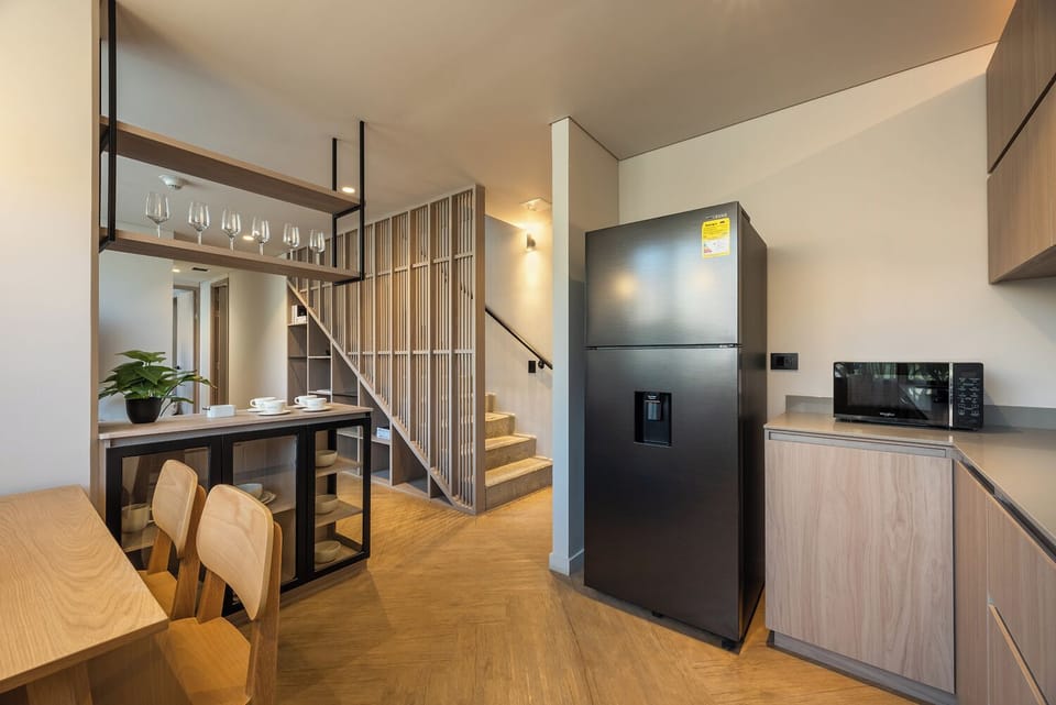Luxury Apartment | Living area | 50-inch flat-screen TV with cable channels