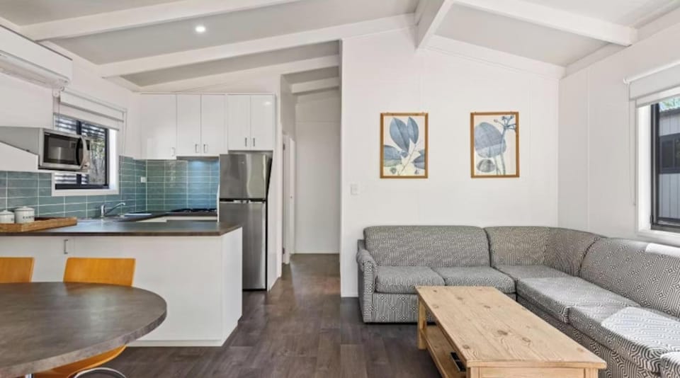 Deluxe 2 Bedroom Cabin - 2 Queen | Living area | LCD TV