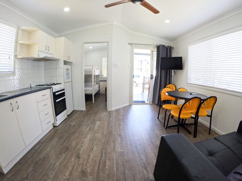 Two Bedroom Villa (5 Guests) | Living area | 34-inch flat-screen TV with digital channels, TV, DVD player