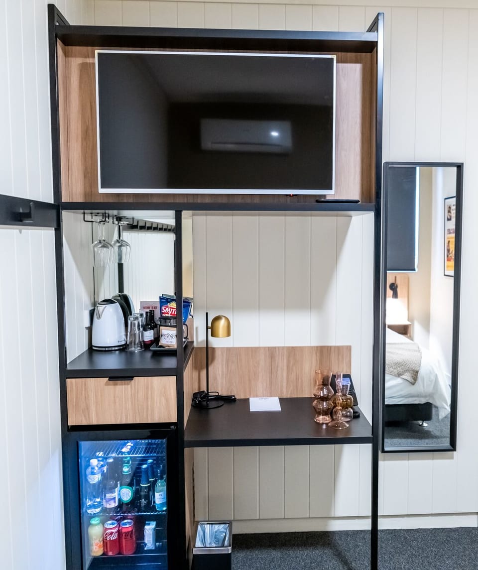 Standard Double Room | Living area | 55-inch LCD TV with digital channels, TV
