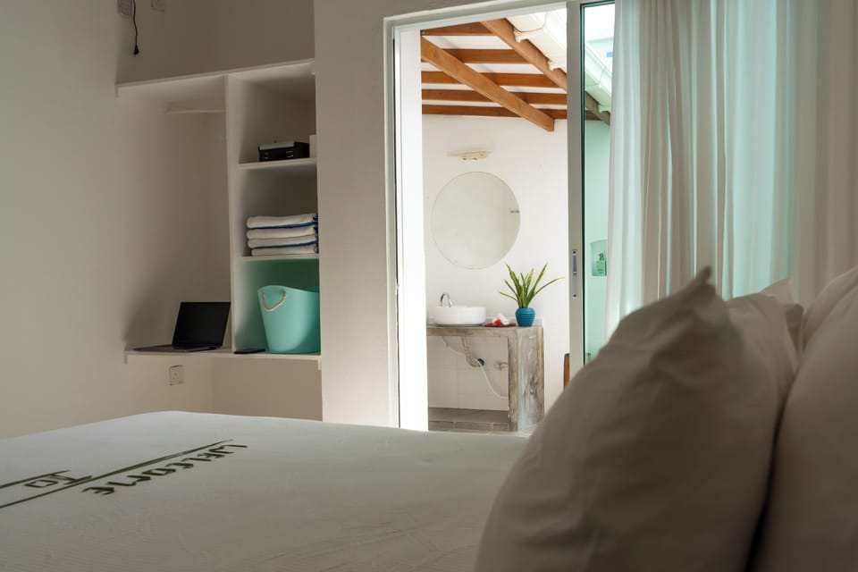Deluxe Room | Down comforters, pillowtop beds, in-room safe, individually decorated