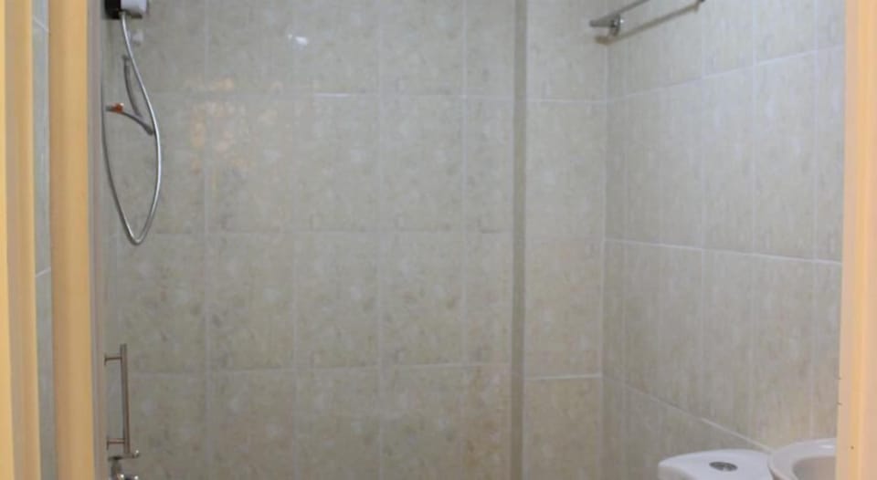 Shower, free toiletries, hair dryer, slippers