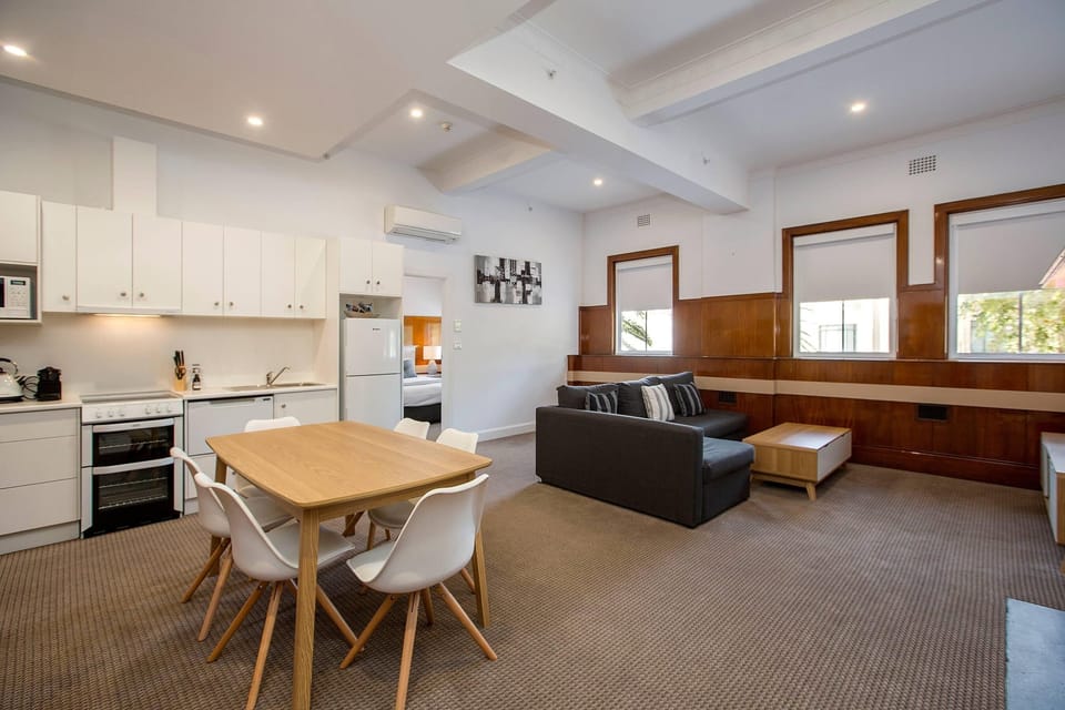 Suite, 1 King Bed, Non Smoking | Minibar, desk, laptop workspace, soundproofing