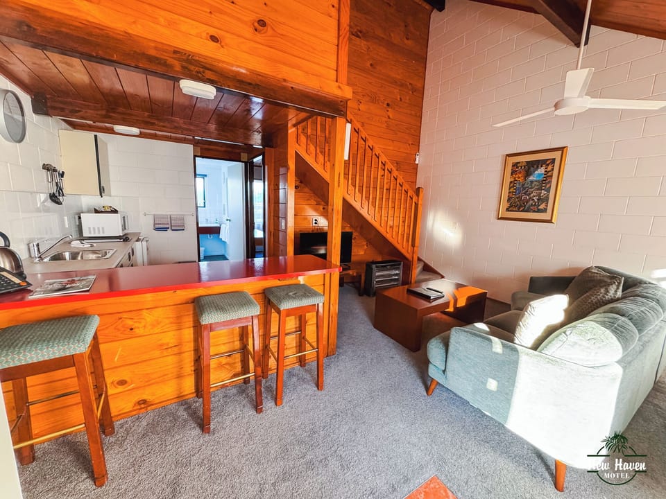 Deluxe Suite, 2 Bedrooms (Alpine Deluxe) | Living area | Flat-screen TV