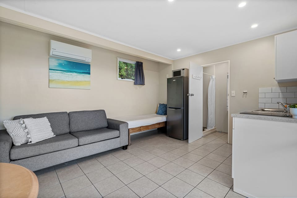 Tourist Flat | Living area | Flat-screen TV