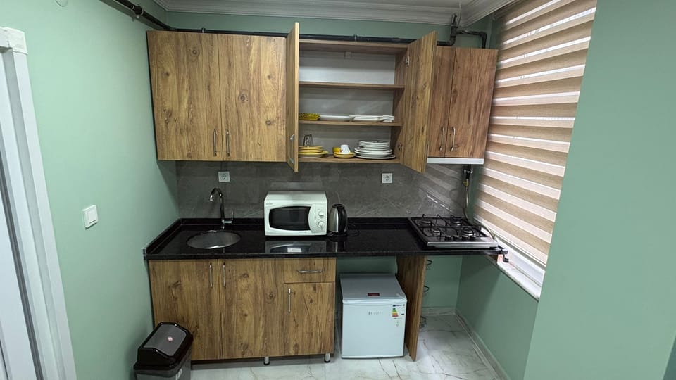 Quadruple Room | Private kitchen | Electric kettle