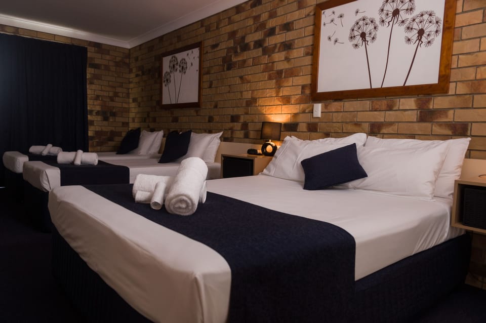 Family Room, Non Smoking, Refrigerator & Microwave | Blackout drapes, iron/ironing board, WiFi (free), bed sheets