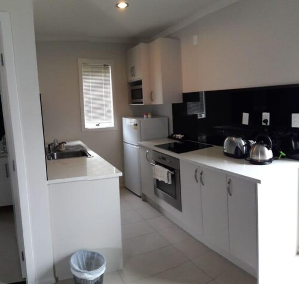 Microwave, stovetop, coffee/tea maker, electric kettle