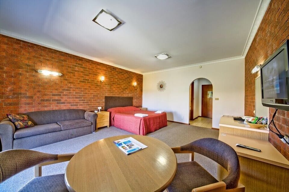 Exclusive Room, 1 Queen Bed, Kitchenette (Exclusive Deal) | Desk, iron/ironing board, free WiFi, bed sheets