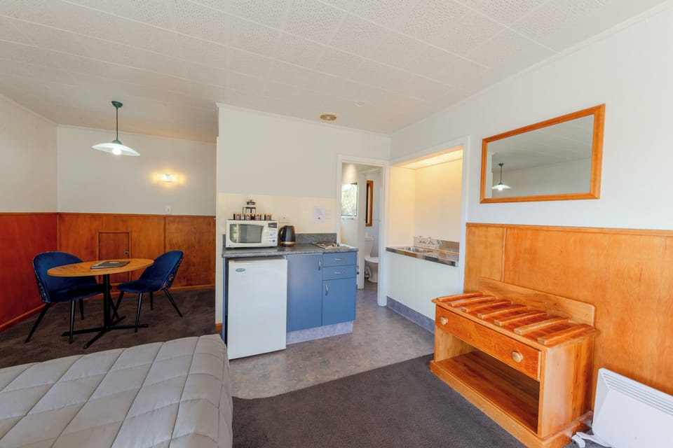 Upstairs Studio Unit with Balcony | Private kitchen | Coffee/tea maker, fridge, microwave, stovetop
