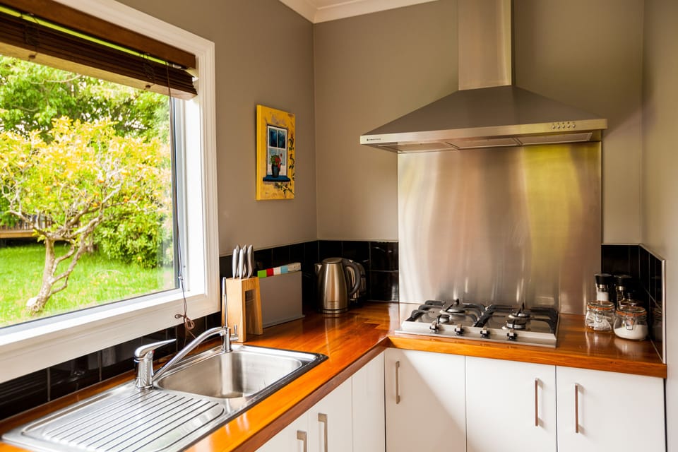 Standard Studio, Non Smoking, Kitchen (DoLittle Cottage) | Private kitchen | Highchair, cookware/dishes/utensils