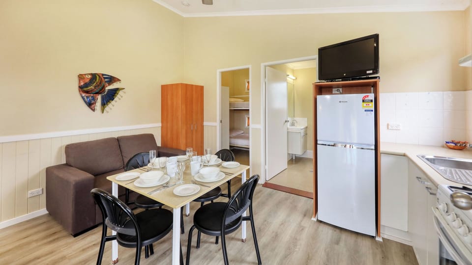 Queen Duplex Cabin | Living area | Flat-screen TV, DVD player