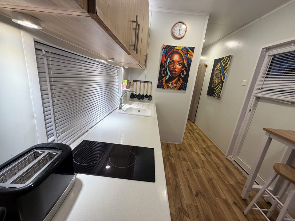 Villa | Private kitchen | Mini-fridge, microwave, stovetop, coffee/tea maker