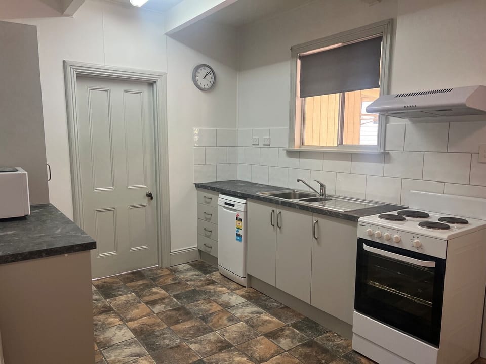 Standard Suite, Multiple Bedrooms, Kitchen (House 2) | Private kitchen | Coffee/tea maker, fridge, microwave (on request), stovetop