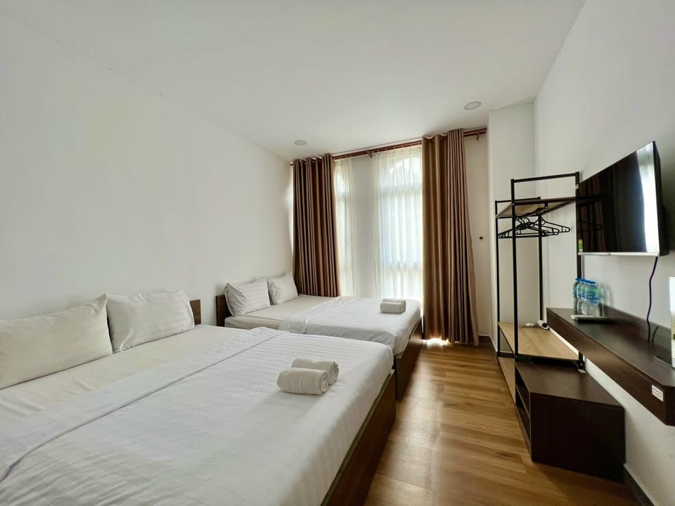 Basic Double Room, 2 Queen Beds, City View | Hypo-allergenic bedding, pillowtop beds, desk, blackout drapes