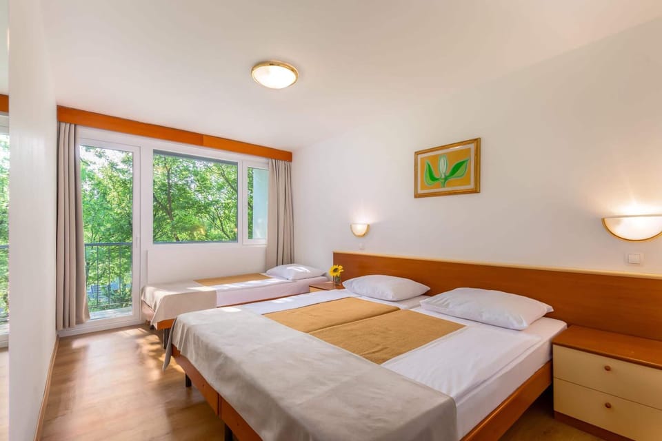 Standard Triple Room, Balcony (Sea Side) | Desk, bed sheets