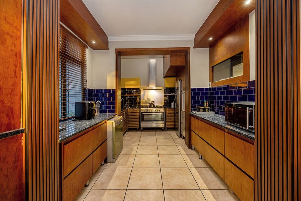Luxury Villa | Private kitchen | Full-size fridge, microwave, oven, stovetop