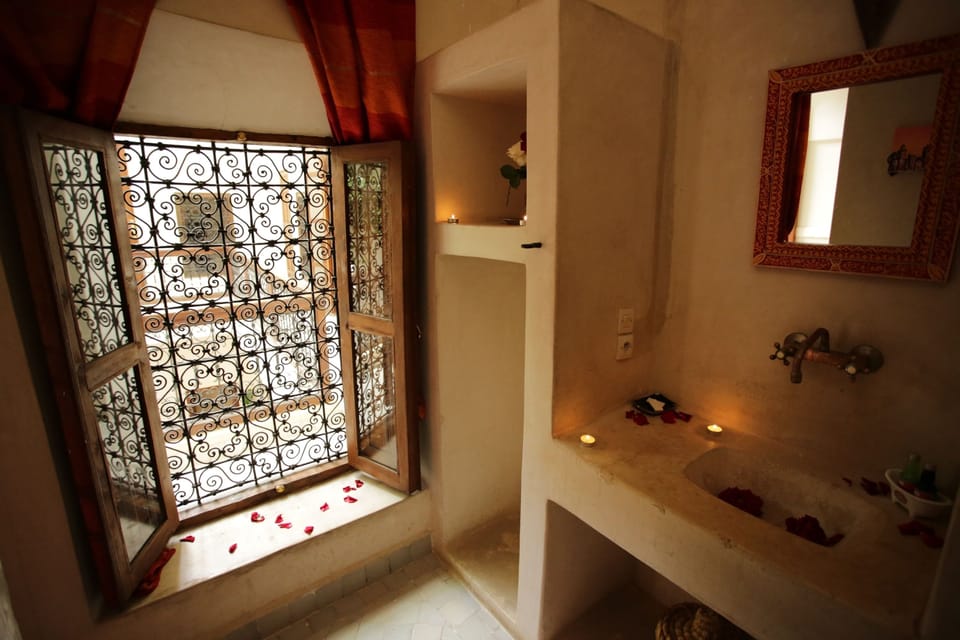 Shower, hair dryer, towels, shampoo