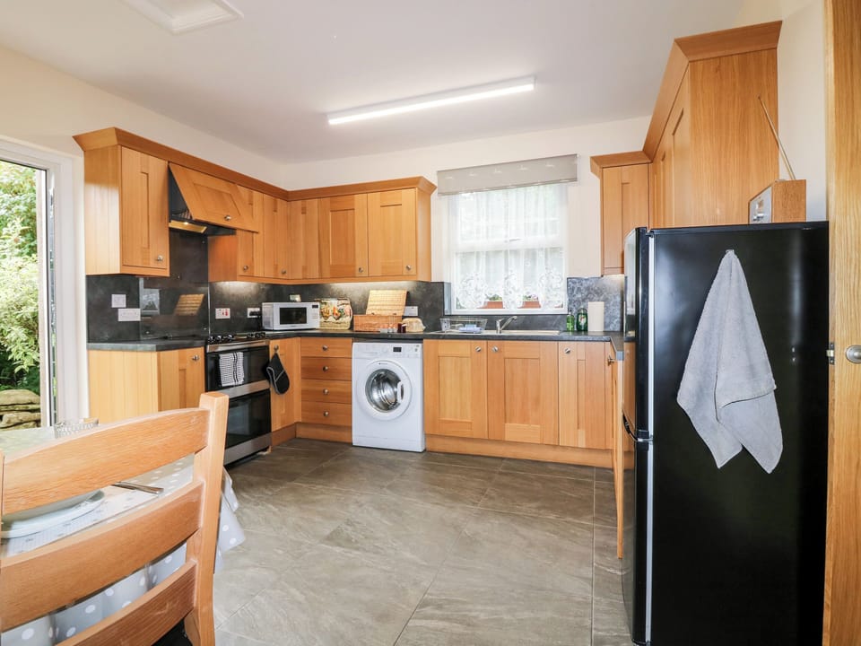 Fridge, electric kettle, toaster, cookware/dishes/utensils