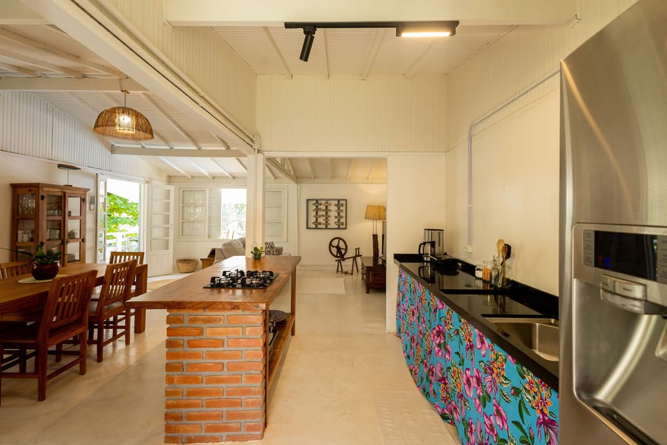 Family Apartment | Private kitchen | Mini-fridge, microwave, stovetop, highchair