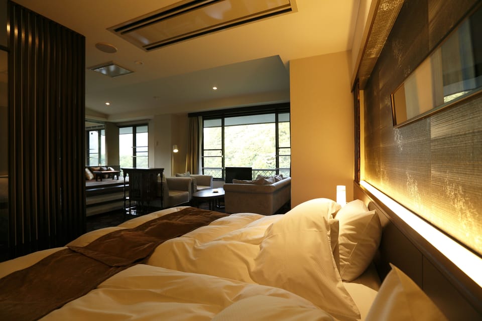 Premium Suite, Non Smoking | 1 bedroom, down comforters, in-room safe, desk