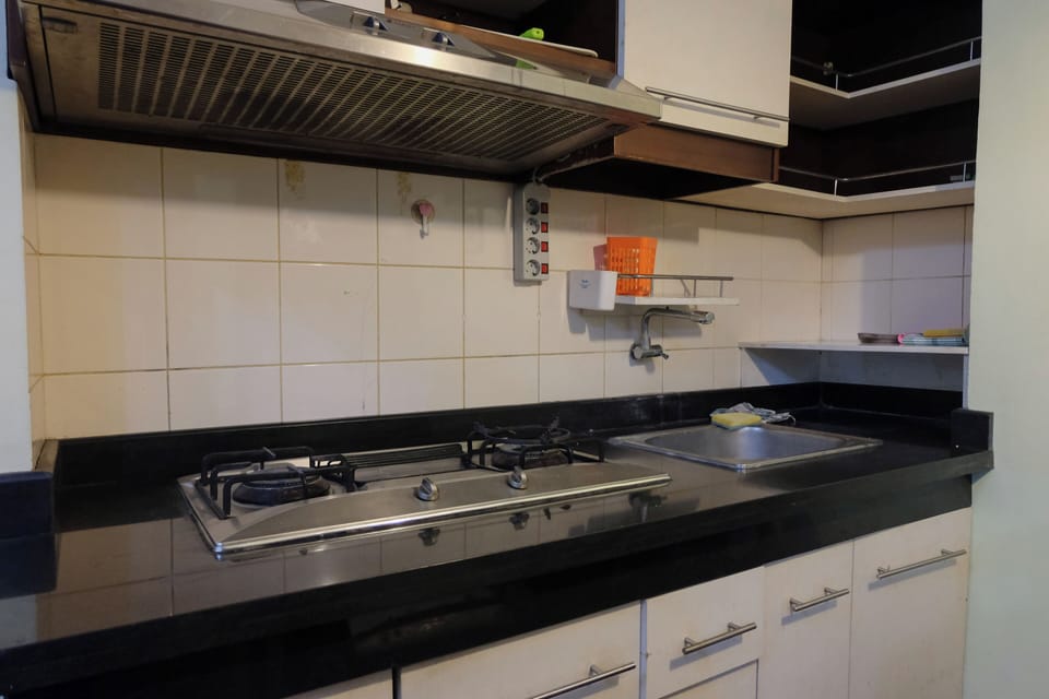 Apartment | Private kitchen | Full-size fridge, stovetop