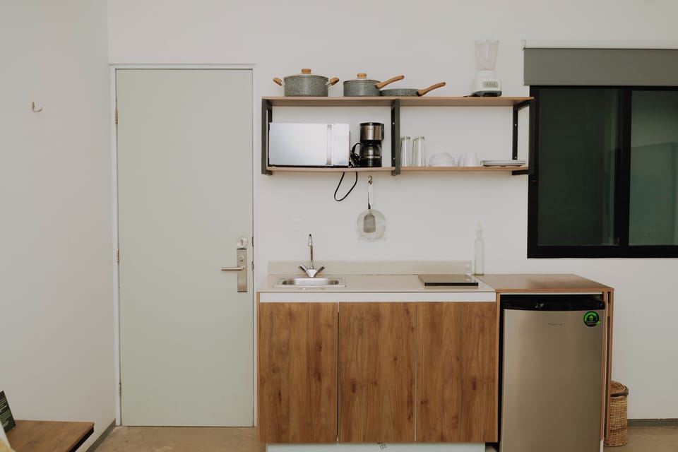 City Room | Private kitchenette | Mini-fridge, microwave, stovetop, cookware/dishes/utensils