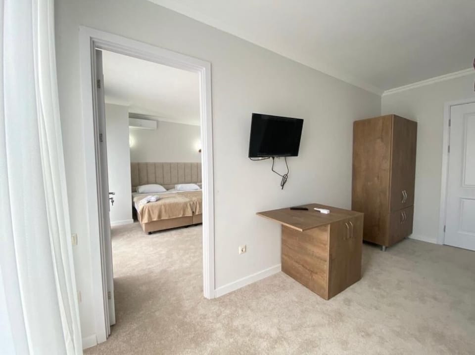 Family Quadruple Room, Mountain View | Pillowtop beds, desk, laptop workspace, free WiFi