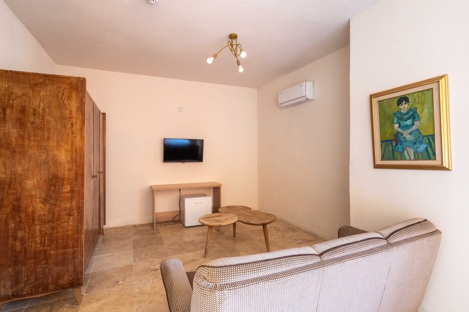 Family Room, 2 Bedrooms, City View | Minibar (some free items), WiFi (free), bed sheets