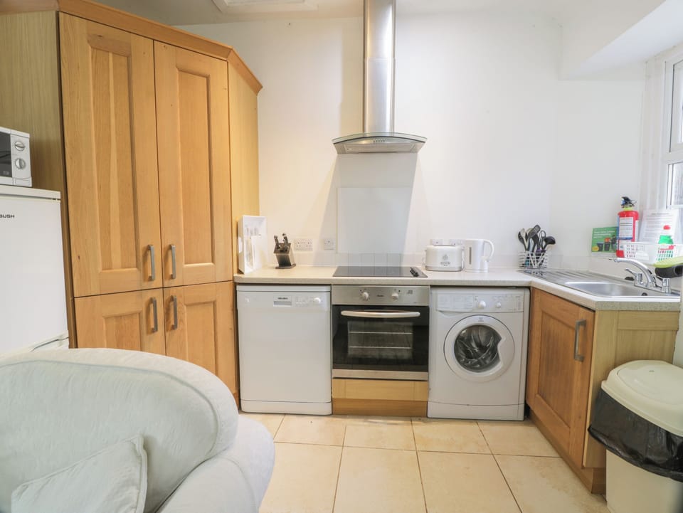 Fridge, electric kettle, toaster, cookware/dishes/utensils