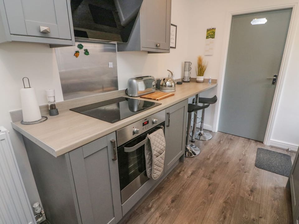 Fridge, electric kettle, toaster, cookware/dishes/utensils