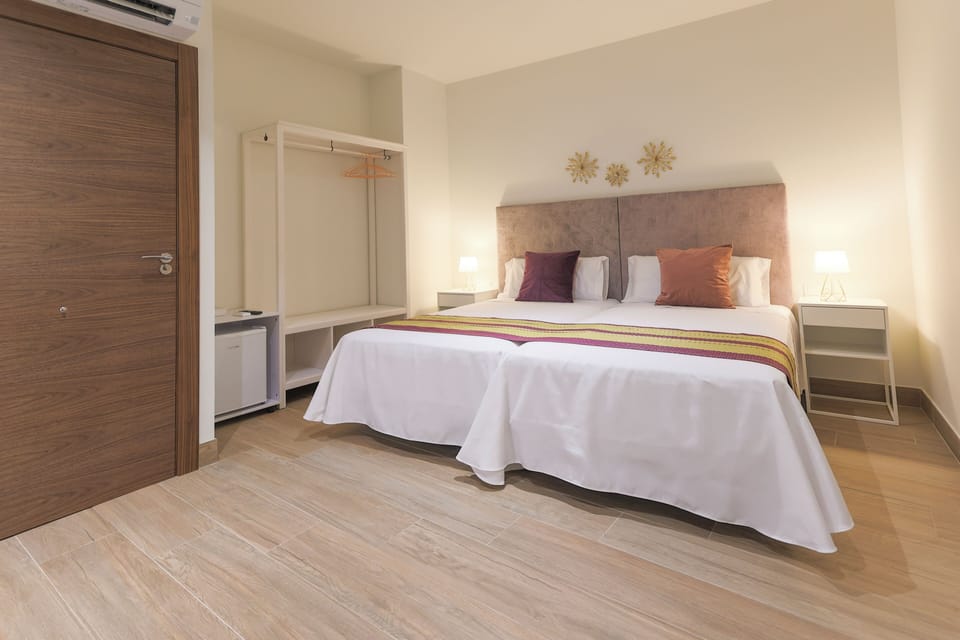 Premier Room | 1 bedroom, blackout drapes, iron/ironing board, free WiFi