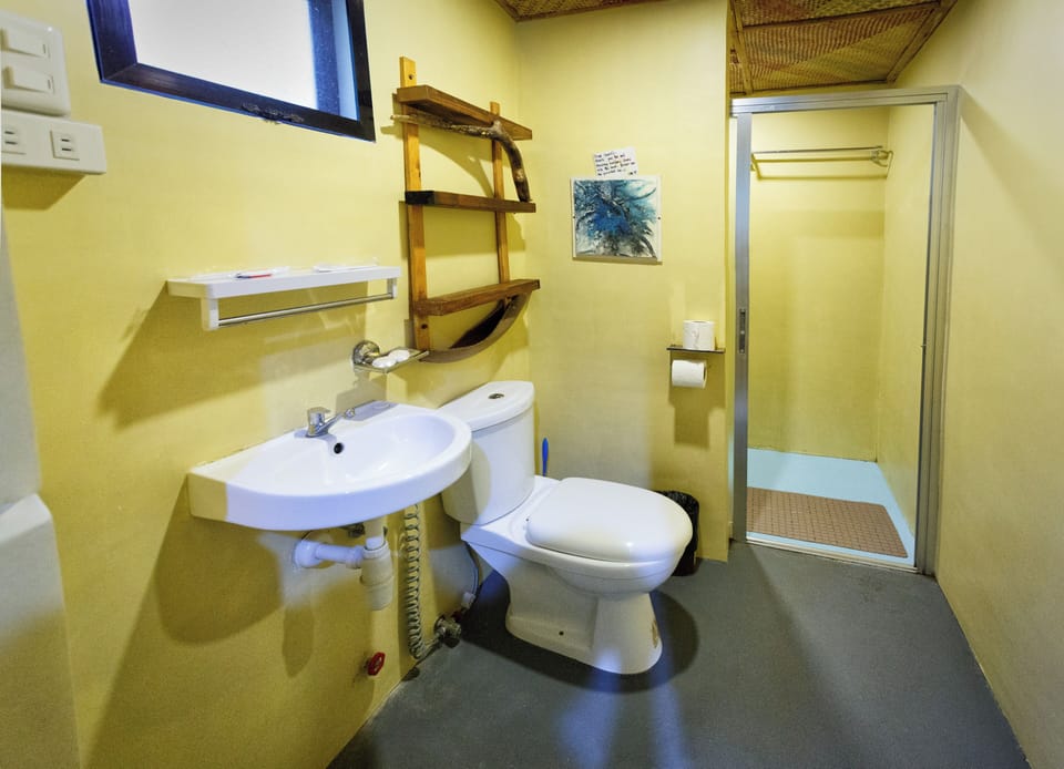 Shower, slippers, bidet, towels