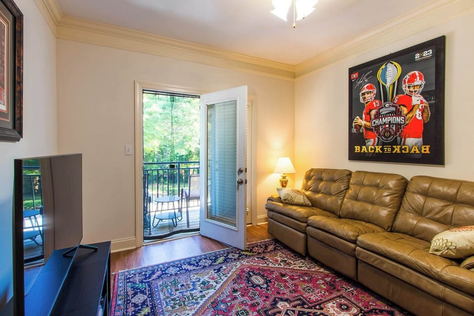 Condo, 2 Queen Beds, Balcony, Garden View (Low Country Dawg House) | Living area | 42-inch flat-screen TV with digital channels