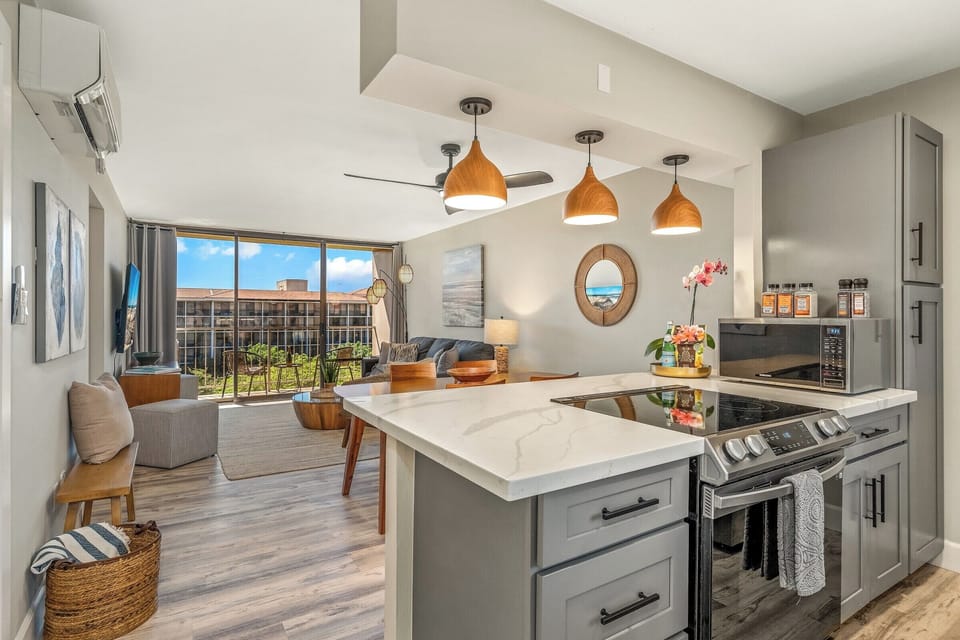 Luxury Condo | Private kitchen | Full-size fridge, microwave, oven, stovetop