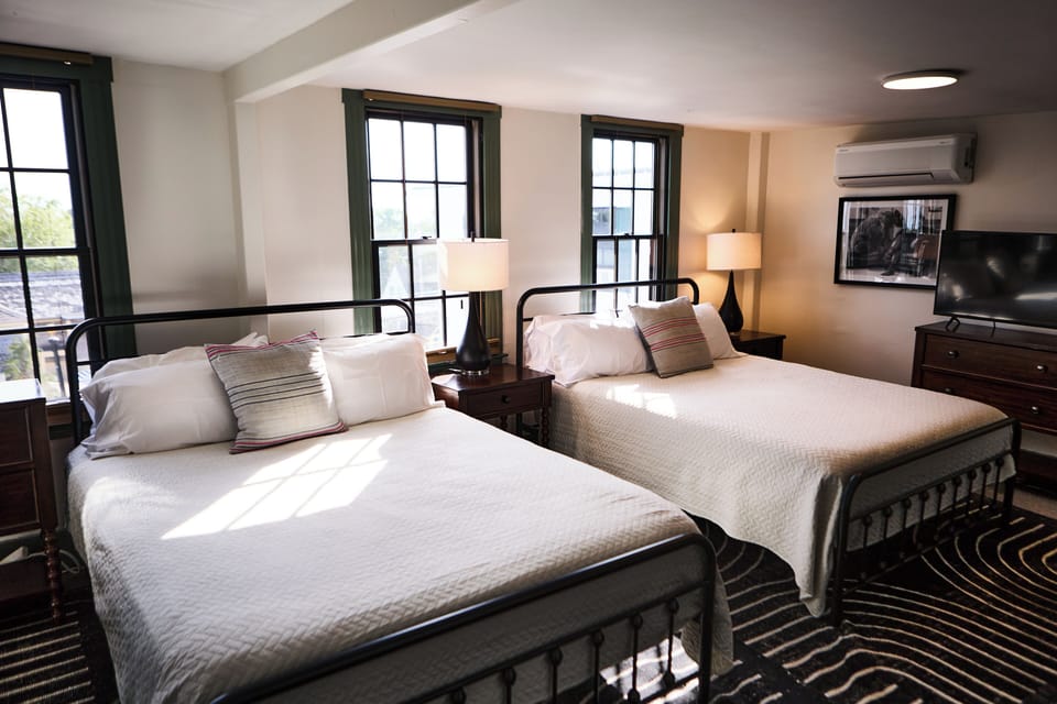 Deluxe Room, 2 Queen Beds | Minibar, iron/ironing board, WiFi (free), bed sheets