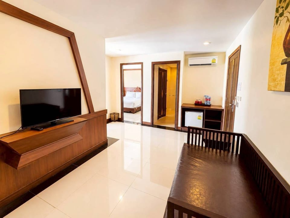 Heritage Sky Beach Suite Two Bedrooms | Living area | 32-inch LCD TV with cable channels, TV