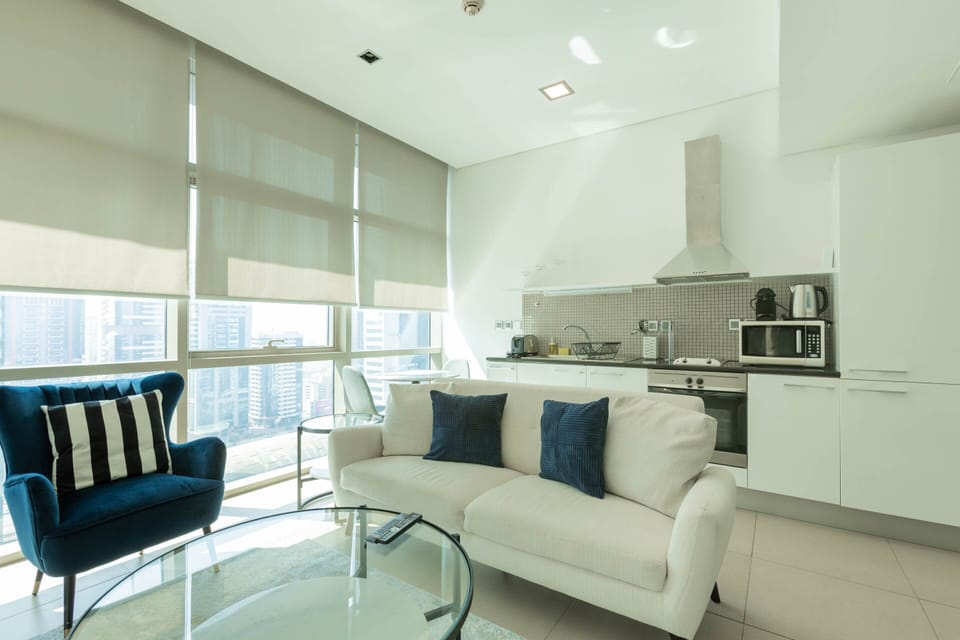 Deluxe Studio | Living area | 50-inch Smart TV with cable channels, Netflix, streaming services
